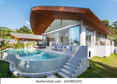 Interior And Exterior Design Of Pool Villa, House, And Home Feature Garden And Infinity Swimming Pool