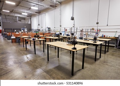 Interior Of Factory With Empty Work Benches