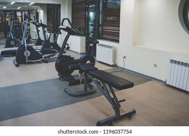 Interior Of A Fitness Hall. Various Gyms For Sports In A Small Home Gym.