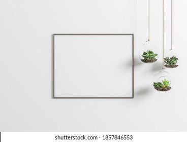 Interior frame mock up with one horizontal wooden frames and plants in vase on white wall background on wood floor. 3D rendering.