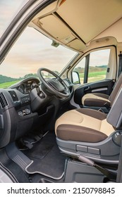 Interior Of The Front Of A Camper Van With Driver Seat