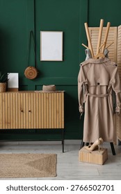 Interior of hall with commode, coat rack and blank frame
