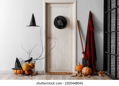Interior of hall decorated for Halloween with light wooden door - Powered by Shutterstock
