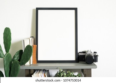 Interior home decor with black frame photo. - Shutterstock ID 1074753014