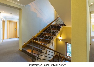 Interior Of A Hotel Corridor With Stairs