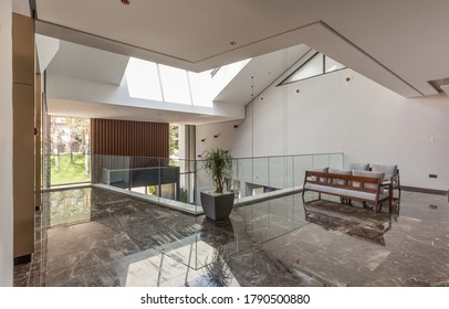 Interior Of A Hotel Lobby With Shiny Marble Floor