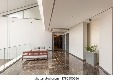 Interior Of A Hotel Lobby With Shiny Marble Floor