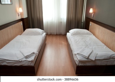 Interior Of A Hotel Room With Two Beds Apart