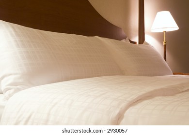 Interior Of A Hotel Suite Room Showing A King Sized Bed