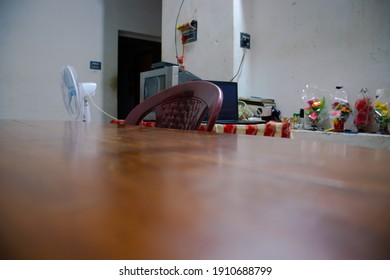 The Interior Of A House. Dining Table And Chairs, Television And Other Accessories Attached To It. This Is The Home Of A Middle Class Family