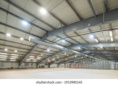 Interior Of Huge Empty Storehouse. Industrial Warehouse Racking.