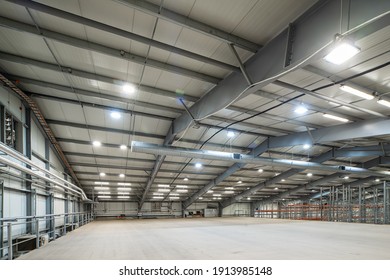 Interior Of Huge Empty Storehouse. Industrial Warehouse Racking.