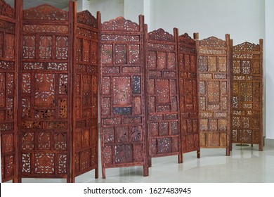 Interior, Indian Furniture. Beautiful Hand-carved Wooden Cover Partition Wall Made Of Mahogany. India.