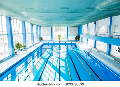 An Interior Of An Indoor Public Swimming Pool.