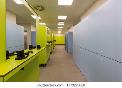 Interior Of A Indoor Swimming Pool Changing And Locker Room With Hair Dryers