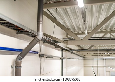 The interior of the industrial shop with daylight and fluorescent lighting - Shutterstock ID 1198895068