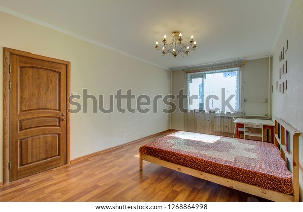 Interior Inexpensive Bright Bedroom Large Bed Stock Photo