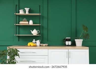 Interior of kitchen with counters, shelf and coffee machine