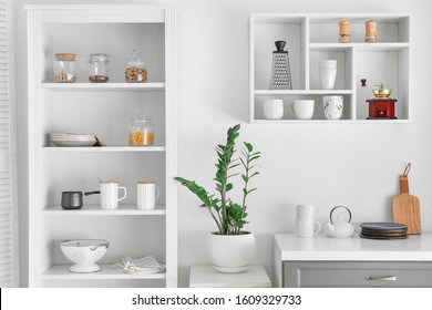 Interior of kitchen with modern shelves