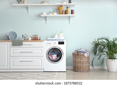 Interior Of Kitchen With Modern Washing Machine