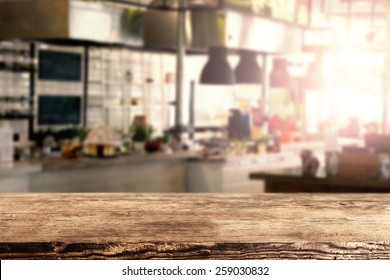 Interior Of Kitchen In Restaurant And Brown Retro Desk Space Of Wood 