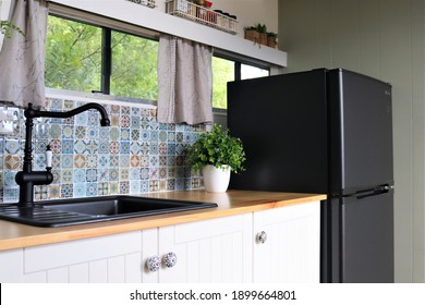 Interior Kitchen Of A Tiny Home In A Truck.