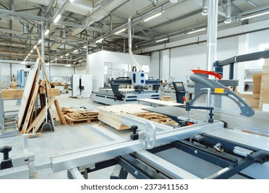 Interior of large workshop of contemporary furniture factory - Powered by Shutterstock