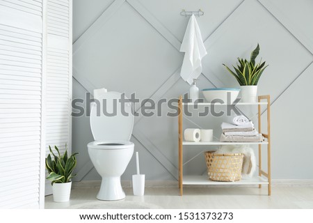 Interior of light modern restroom