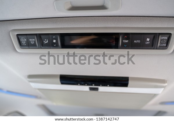 Interior lights in the car with air\
conditioning grille. air conditioning control panel in\
car.