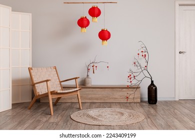 Interior of living room with armchair and decor for Chinese New Year celebration - Shutterstock ID 2243409199