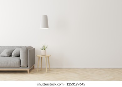 Interior of living room modern style with grey fabric sofa,wooden side table and white ceiling lamp on wooden floor. - Shutterstock ID 1253197645