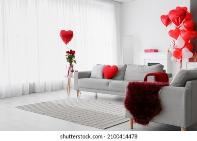 Interior of living room with sofa and decor for Valentine's Day - Shutterstock ID 2100414478
