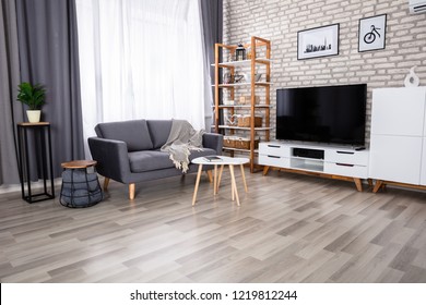 Interior Of A Living Room With Sofa And Furniture - Powered by Shutterstock