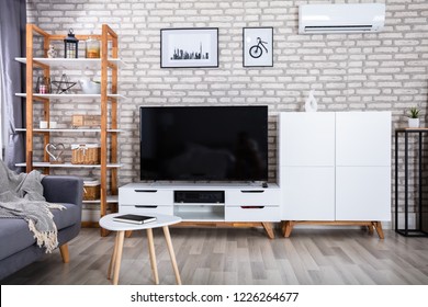 Interior Of A Living Room With Sofa And Furniture - Powered by Shutterstock