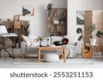 Interior of living room with sofa, table and musical instruments