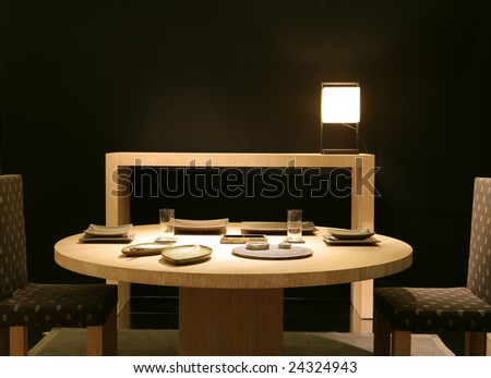 interior of the luxurious dinning-room with green dishes on table