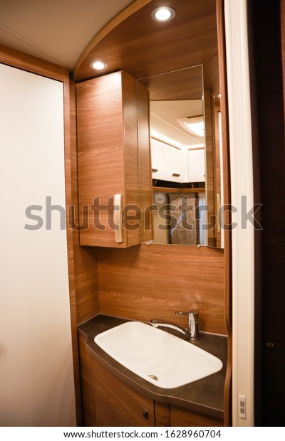 Interior of luxury caravan. Detail photo of\
coach with equipment