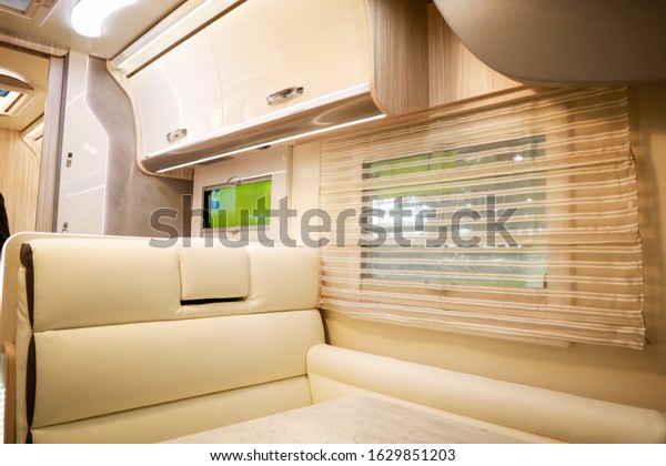 Interior of luxury caravan. Detail\
photo of coach with\
equipment.Kitchen