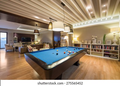 Interior Of A Luxury Living Room With Pool Table
