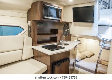 Interior of luxury yacht. Yacht cabin from leather material. 