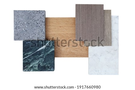 interior material board including douglas fir wooden veneer ,terrazzo stone ,white and green marble tile ,oak wooden engineering or laminated flooring samples isolated on white background.