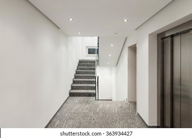 Interior Of A Modern Apartment Building, Corridor With Elevator