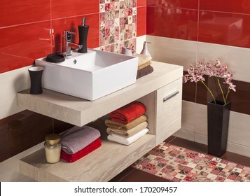 Interior of modern bathroom with sink and toilet