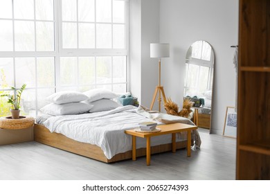 Interior Of Modern Bedroom With Mirror