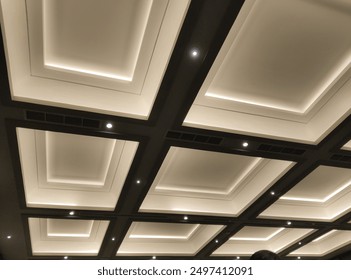 Interior of a modern building, fluorescent lamp on the modern ceiling. Lighting on the modern office ceiling - Powered by Shutterstock