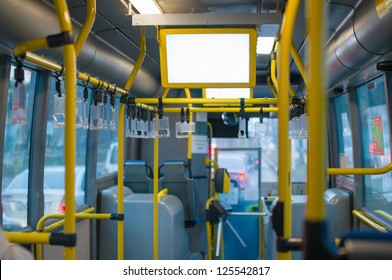interior of modern city bus with information screen