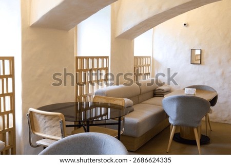 The interior of a modern cozy cafe features an elegant design that defines its charm and appeal