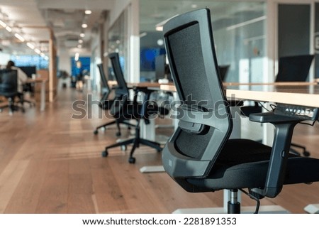 Interior of modern empty office building.The focus is on the seat