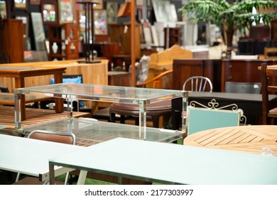 Interior Of Modern Furniture Shop With Variety Of Dining Room Tables, Chairs And Sets For Sale