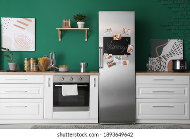 Interior Of Modern Kitchen With Refrigerator